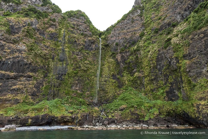 Waterfall flowing down a cliff. 