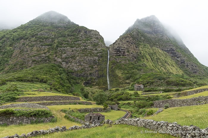 Waterfall flowing down a mountainside.